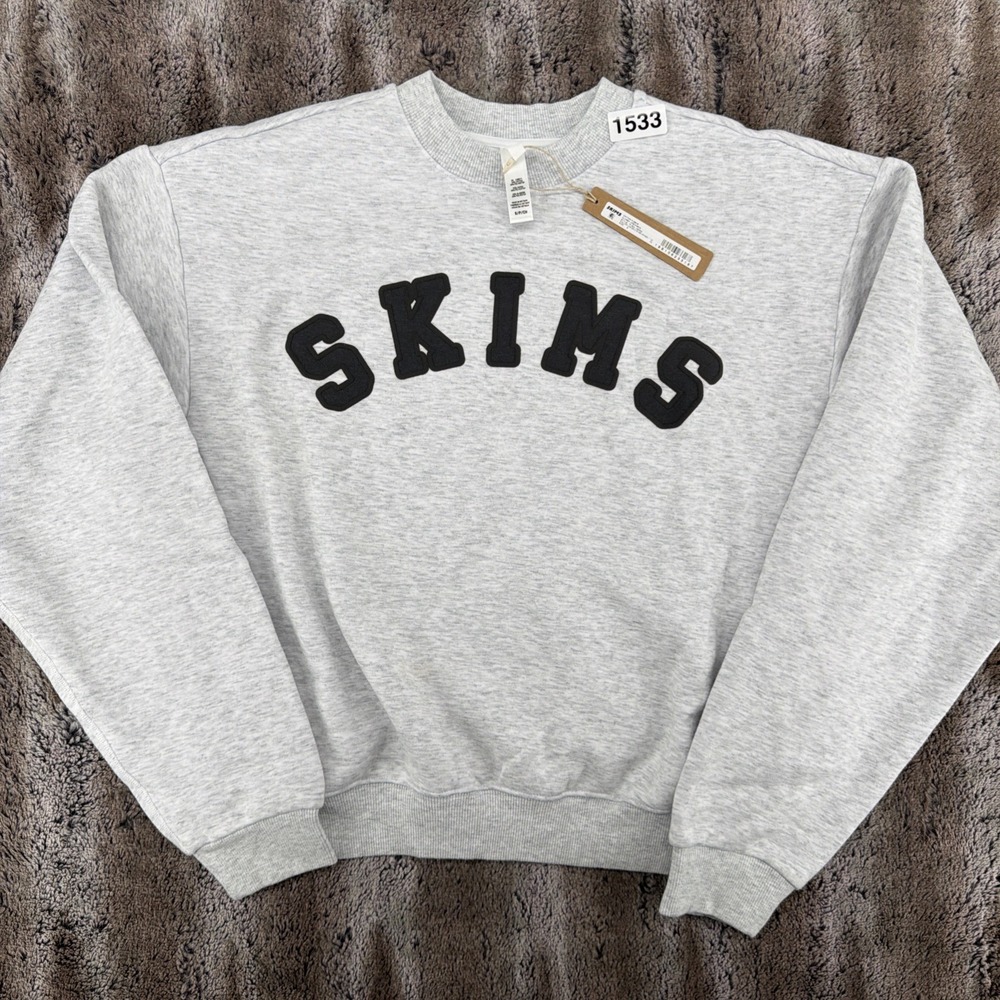 NWT SKIMS LOGO CLASSIC CREWNECK SWEATSHIRT HEATHER GRAY SPELLOUT SIZE SMALL